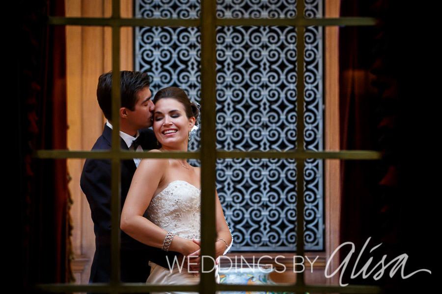Bride and Groom pose for wedding photos at Duquesne Club wedding reception